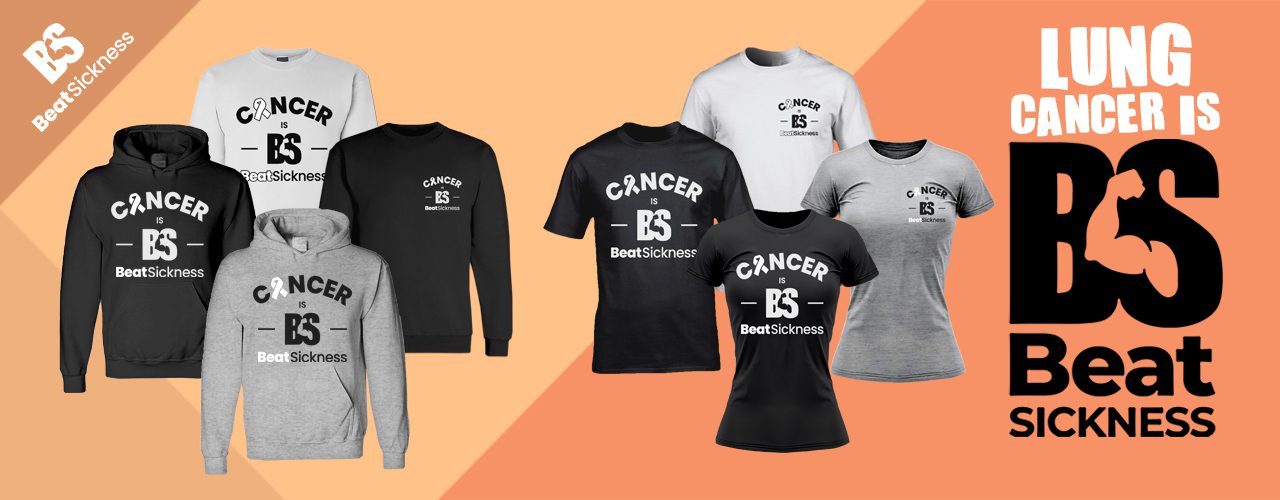 Collection of black and white shirts with cancer awareness designs.